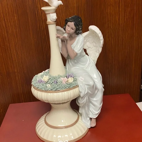 Grandeur Noel Porcelain Angel sculpture in fountain